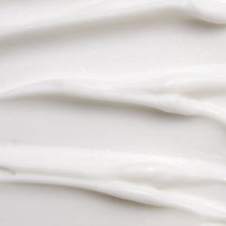 Cosmetic liquid cream white background texture closeup